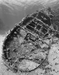 a shot of the Tug Boat wreck, Abu Galawa with black and w... by Nick Blake 